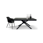 Tavolo allungabile base in metallo e piano finitura in acciaio ossidato