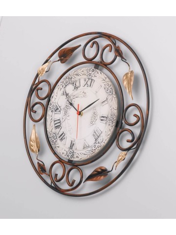 Orologio tondo in ferro battuto decorato con foglie quadrante in ceramica