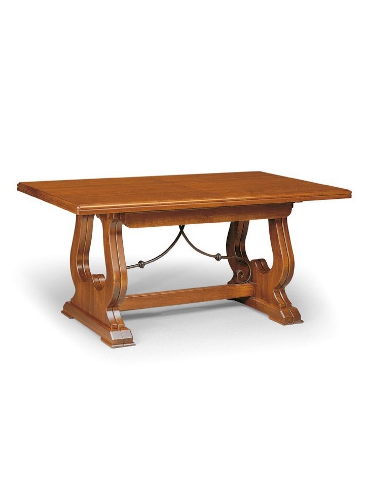 Tavolo da pranzo con gambe ad arpa con elemento in ferro